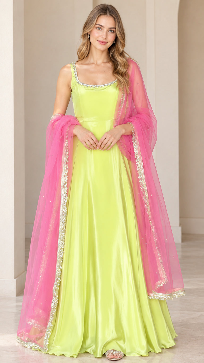 Full front view of model wearing lime green sleeveless flared gown with contrasting pink embellished dupatta