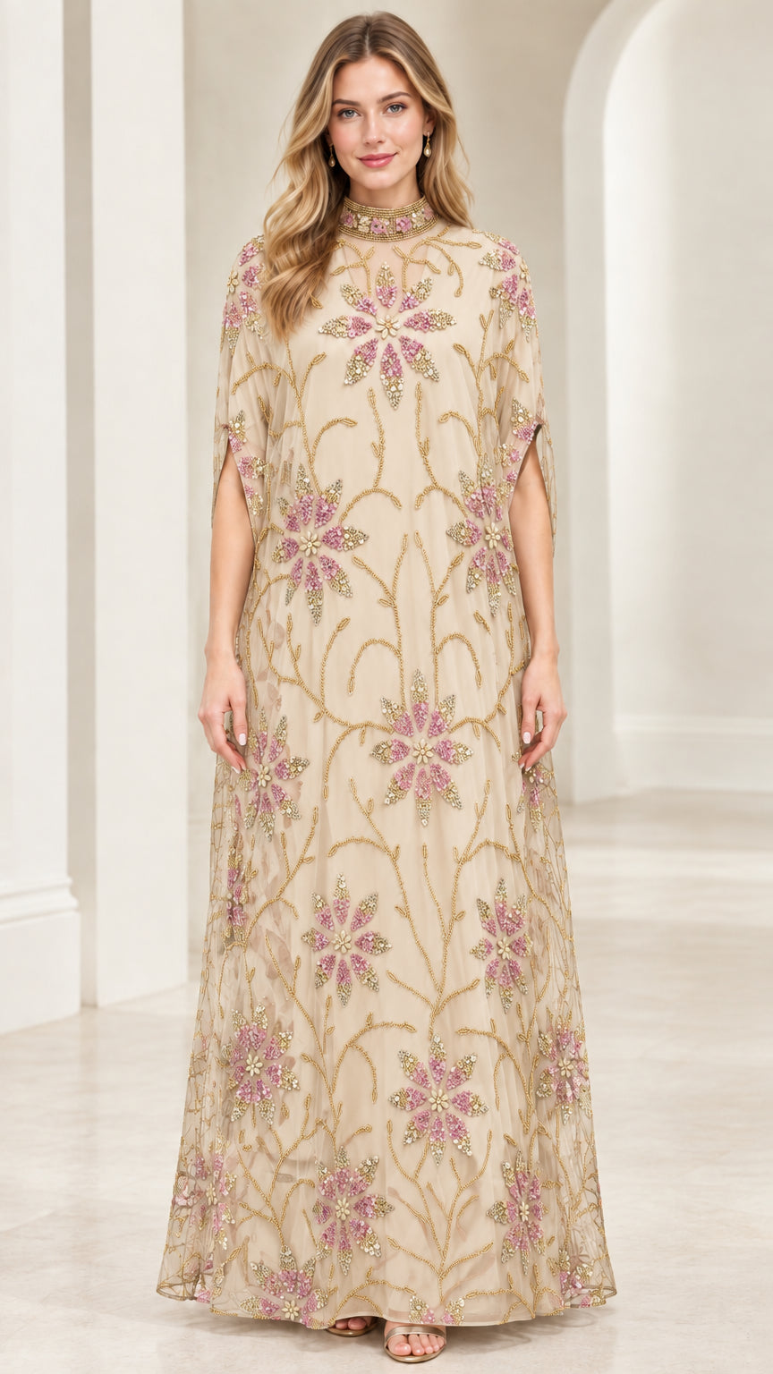Front full view of champagne beige floral beaded cape maxi dress