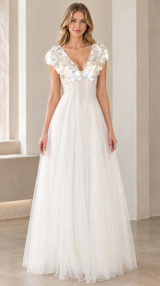 Front view of model wearing white sequin cap sleeve tulle evening gown