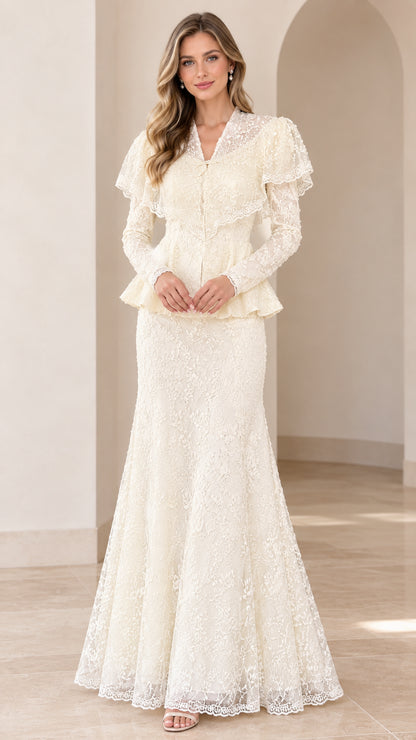 Full-length front view of woman wearing ivory long sleeve lace maxi dress with peplum waist