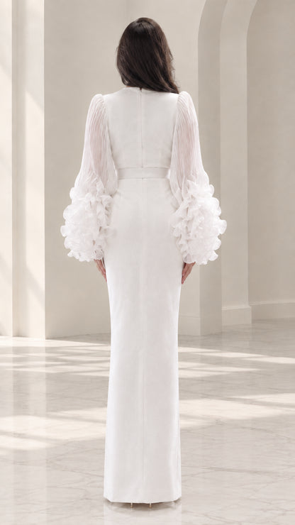 Back view of white long sleeve evening gown with concealed zipper