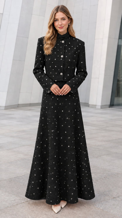 Front view of model wearing Black embellished tweed cropped jacket and maxi skirt set