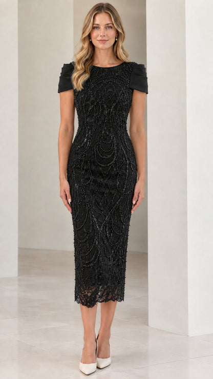 Front view of woman wearing Black beaded midi sheath formal dress