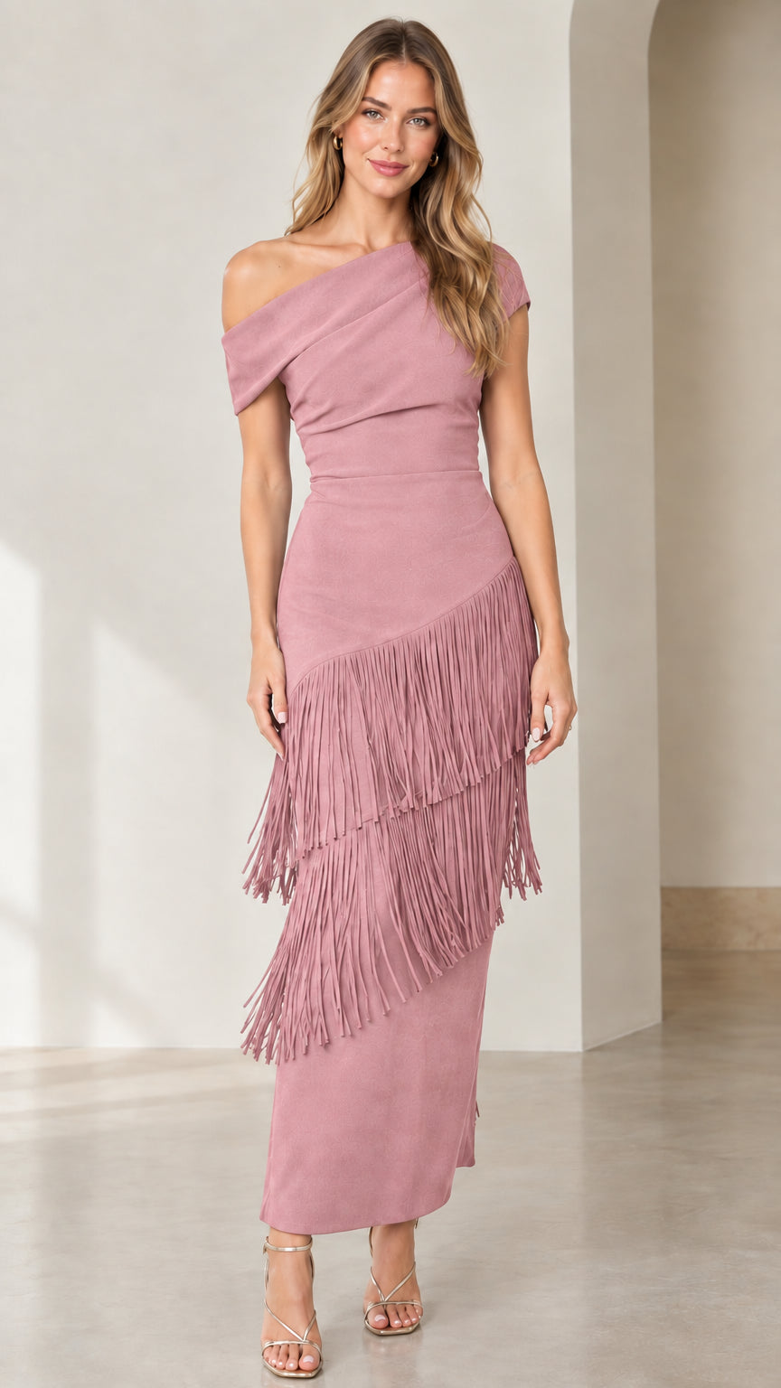 Front view of dusty rose pink one-shoulder tiered fringe midi dress