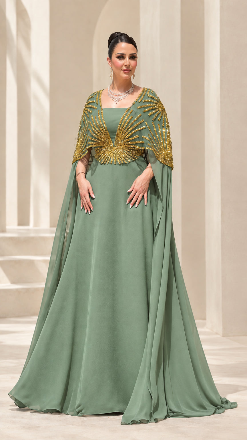 Sage green formal maxi dress with gold sequin cape overlay
