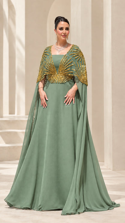 Sage green formal maxi dress with gold sequin cape overlay
