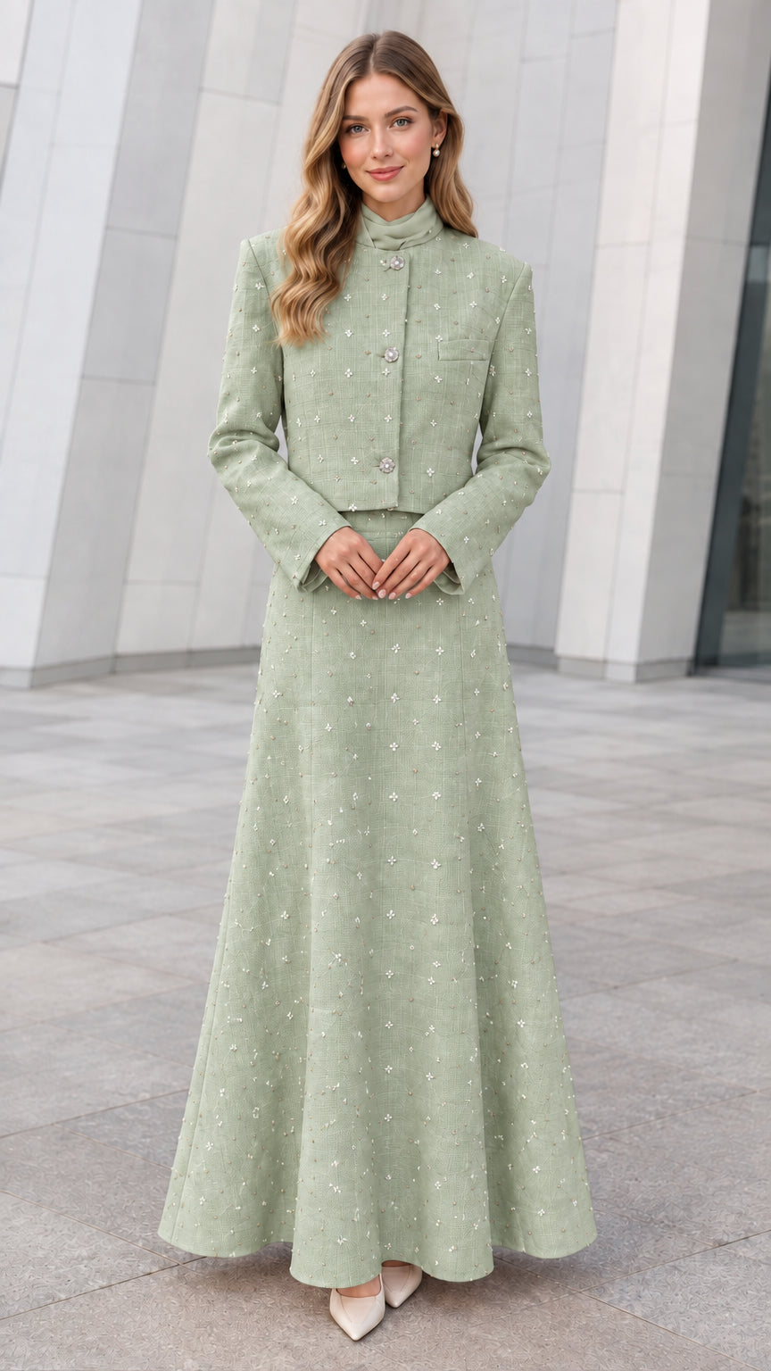 Front view of model wearing Sage Green embellished tweed cropped jacket and maxi skirt set