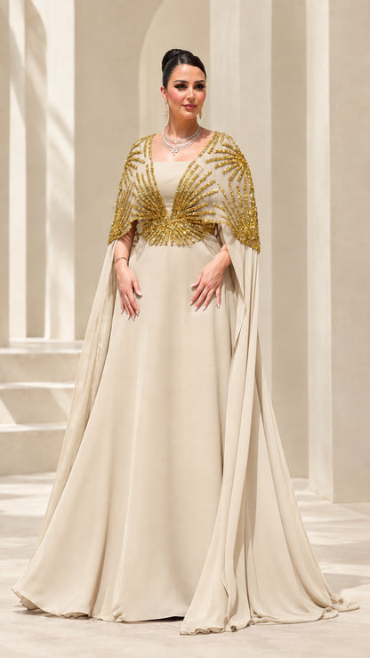 Champagne beige formal cape evening gown with gold sequined bodice