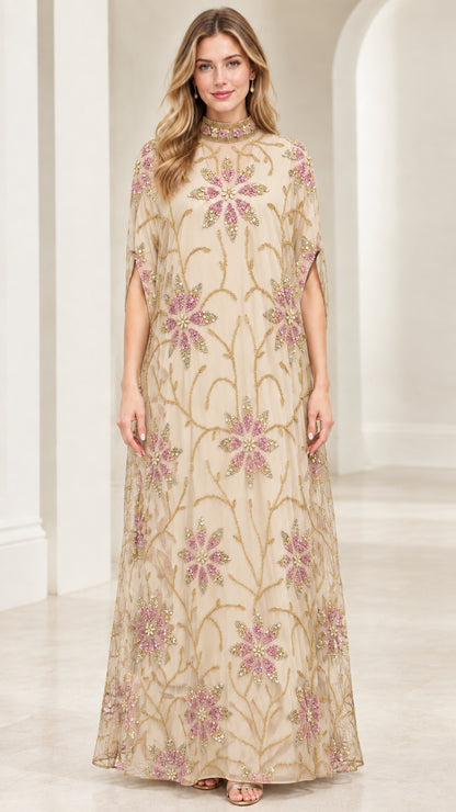 Front full view of champagne beige floral beaded cape maxi dress